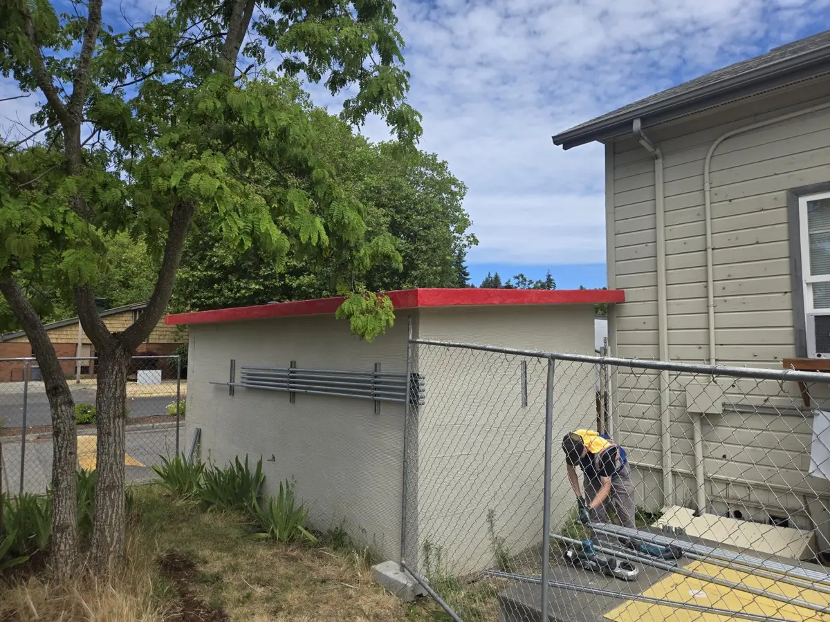 Electrical work on a secondary utility building on the fleet lot
